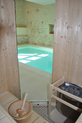 The indoor swimming pool veiwed from the sauna